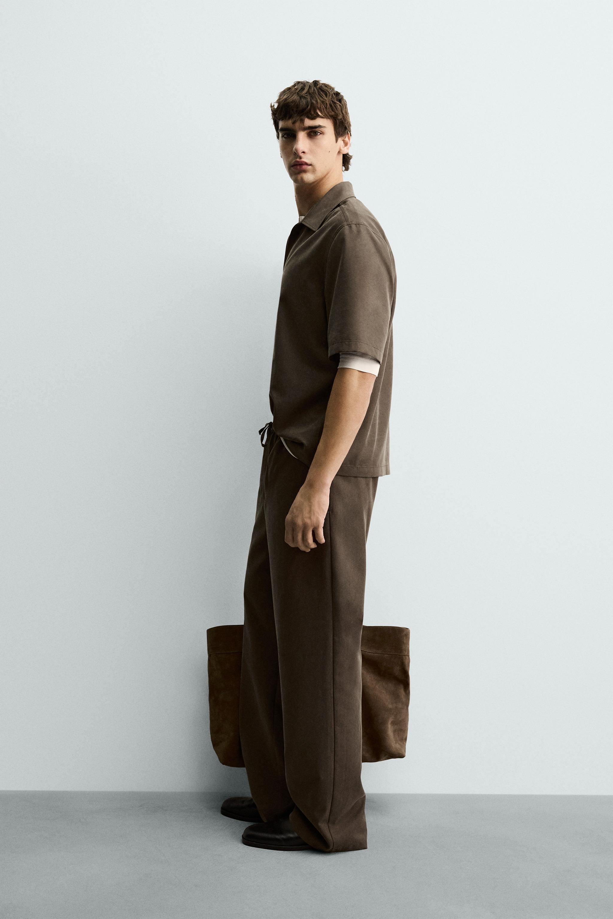 FLOWY WIDE FIT PANTS